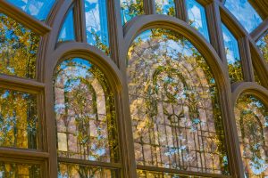 Restored historic stained glass windows at University United Methodist Church. Historic preservation by Heimsath Architects.