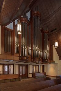 New Létorneau Organ is cantilevered over doors and windows between nave and narthex. Good Shepherd Episcopal Church.