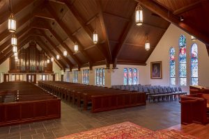 Renovated church interior includes lighting, air-conditioning, finishes, flooring, acoustics, and new organ. Good Shepherd, Austin.