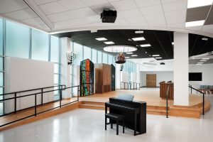 Handicap access ramp for new worship platform in renovated Smith Auditorium. Austin, Texas by Heimsath Architects.