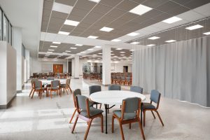 Social hall partitions using curtains for Jewish congregation renovation project in Austin, Texas.