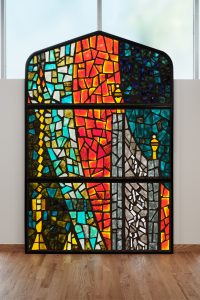 Upper panels of restored Mid-Century stained glass repurposed for new worship space, Congregation Beth Israel.