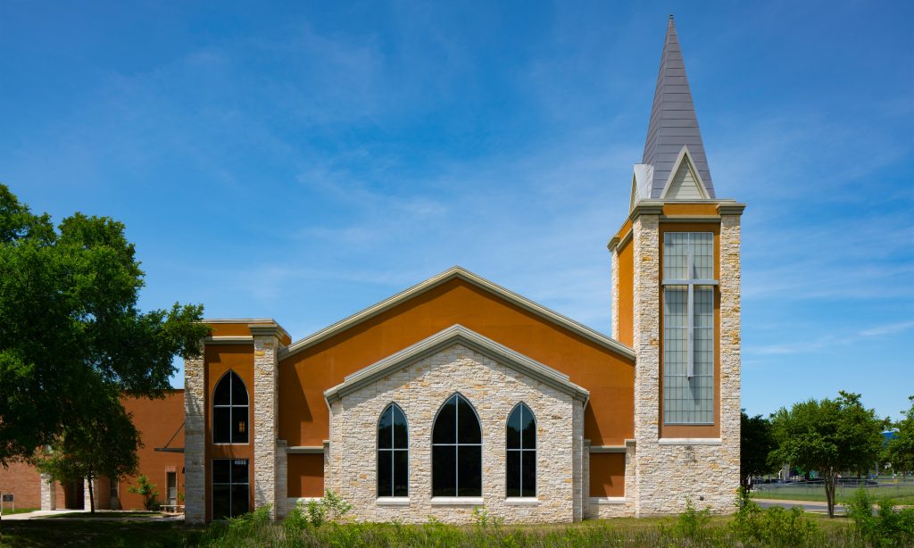 New sanctuary with contemporary steeple for Woodlawn Baptist Church, Austin by Heimsath Architects.