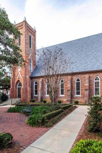 Historic Episcopal church with newly preserved steeple. View from courtyard, Tallahassee, Florida.